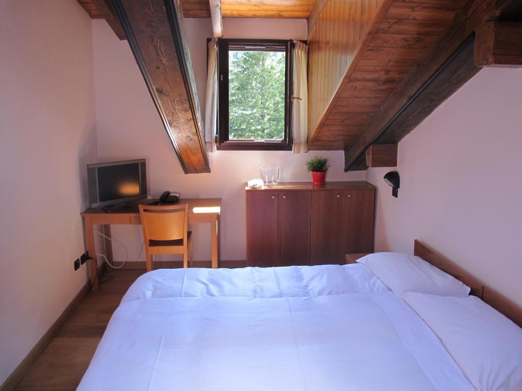 Bed and Breakfast Casa Alpina Don Guanella Макуньяга Номер фото